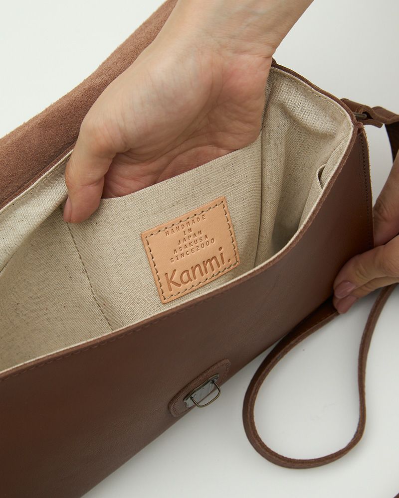 Kanmi.のヌメ革レザータグ